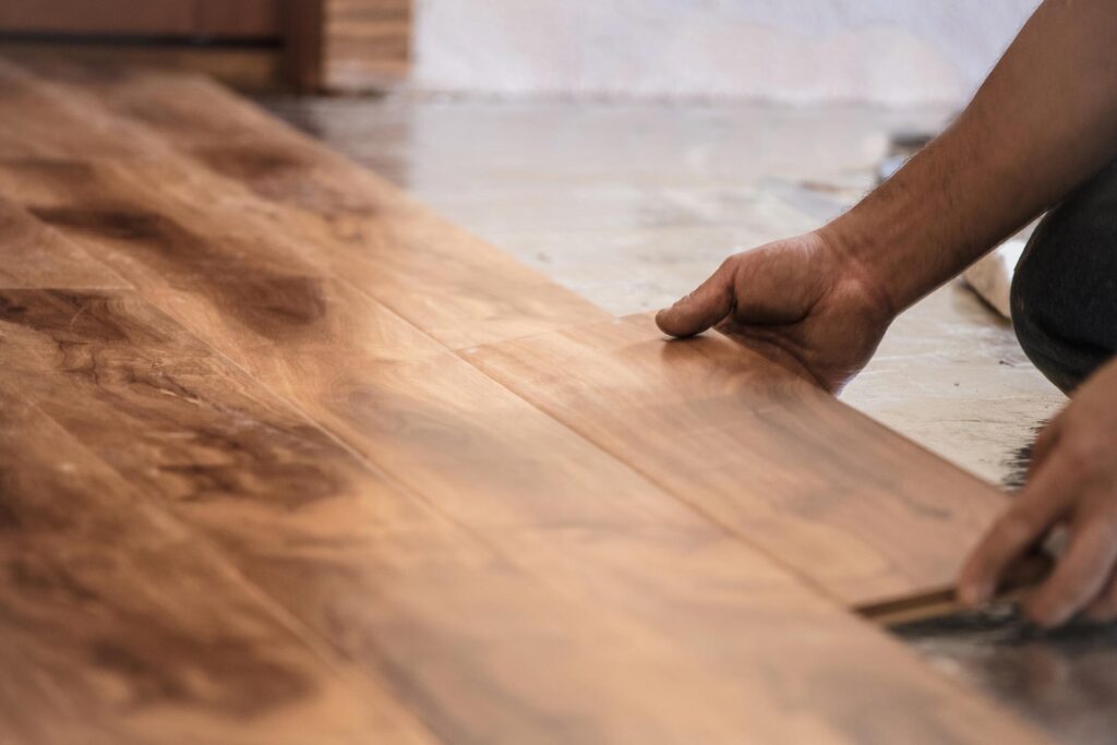 Person laying timber floor